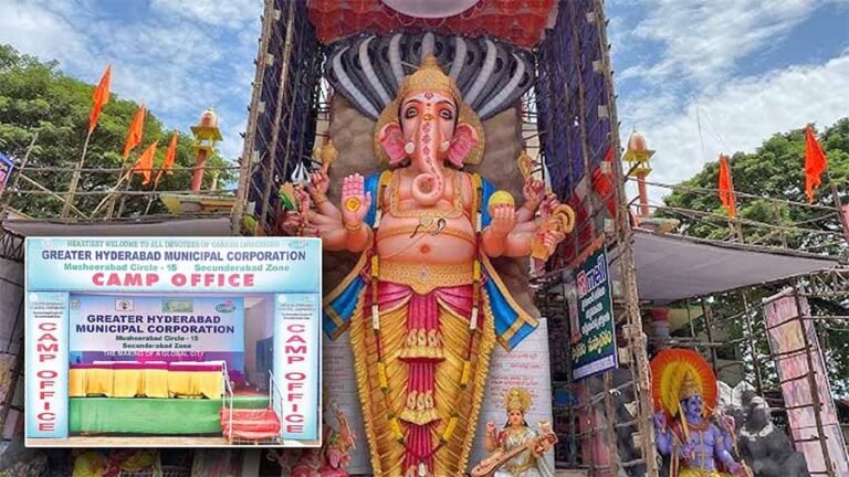 Heavy machinery and sanitation workers preparing for Ganesh idol immersion at Hussain Sagar