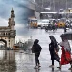 Waterlogged Hyderabad roads with vehicles and people during heavy monsoon rain in August 2025.