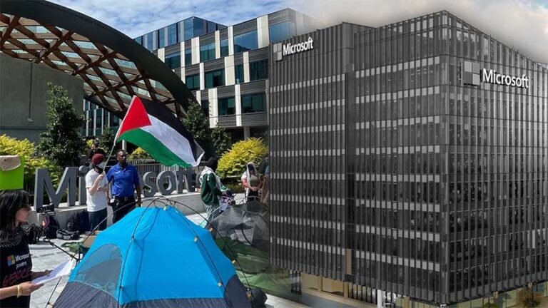 Microsoft sign with red paint during protest over surveillance allegations and Israeli military ties.