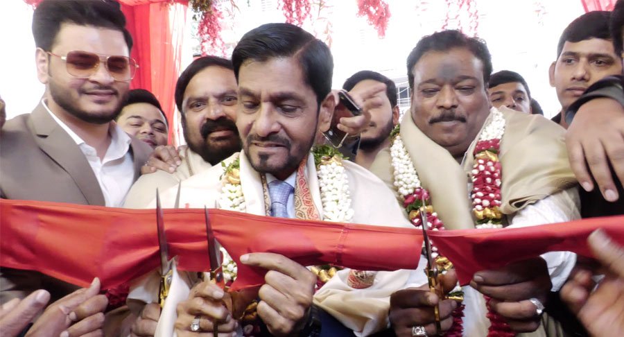 Event image from the Red Rose Mart Tolichowki inauguration featuring ribbon-cutting ceremony.